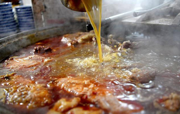 2. Add ground meat. Cook for about 5 to 7 minutes, until browned and no longer pink. Cook the meat with a wooden spatula. When cooked, turn off the Instant Pot. Drain grease if needed. 3. Add 1/2 cup broth or water. Scrape the bottom of the pan with a wooden spoon or spatula; this will help keep the meat from burning and sticking to the pan.   4. Cut the spaghetti in half. Place in the pot and layer the noodles in a criss-cross pattern. This will help reduce clumping.   5.Add the rest of the soup or water, spaghetti sauce and canned tomatoes (with liquid). Pour these ingredients into the center of the pot. Again, this will minimize burning.  6.Press and eat until most, if not all, of the noodles are submerged.Do not stir the pasta.    6. Close the lid and seal the valve. Set to "Pressure Cook" for 8 minutes. It takes about 10 minutes for the Instant Pot to reach the correct pressure, and then it will start the countdown. The Instant Pot will beep 8 minutes after it's done. Use the quick release to relieve pressure. The Instant Pot will release a rapid flow of pressure, so make sure your face or hands are not near the valve.